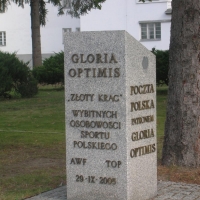Gloria Optimis